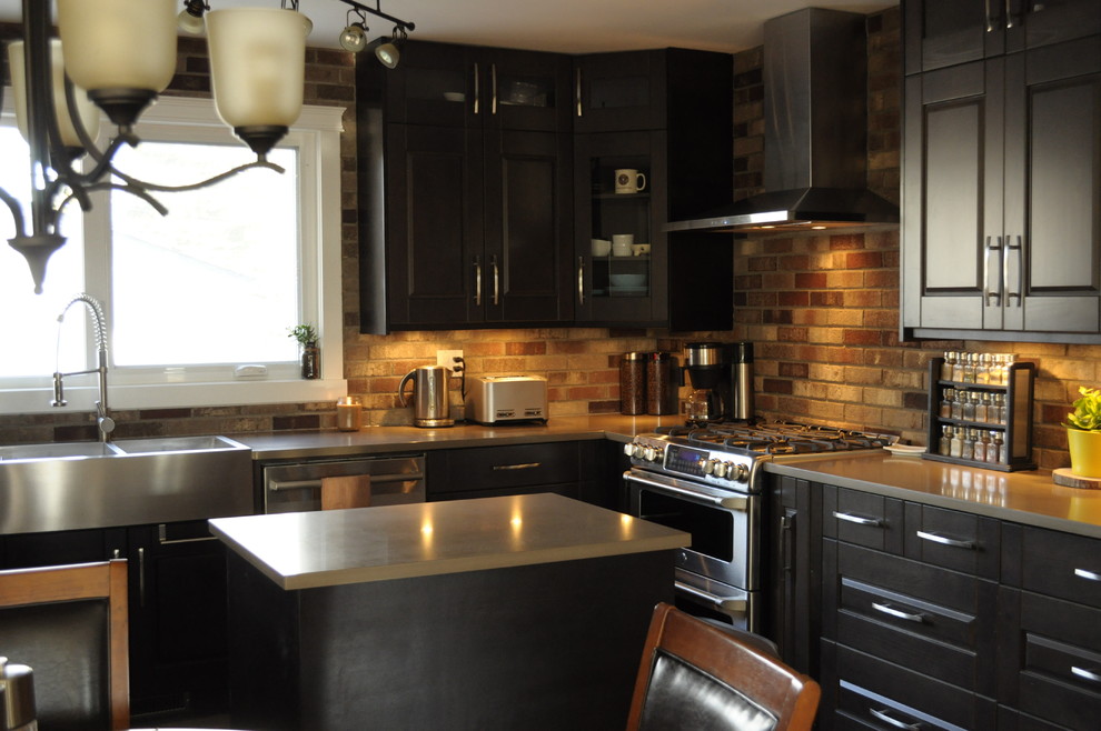 Kitchen - rustic kitchen idea in Calgary with shaker cabinets, dark wood cabinets, granite countertops and an island