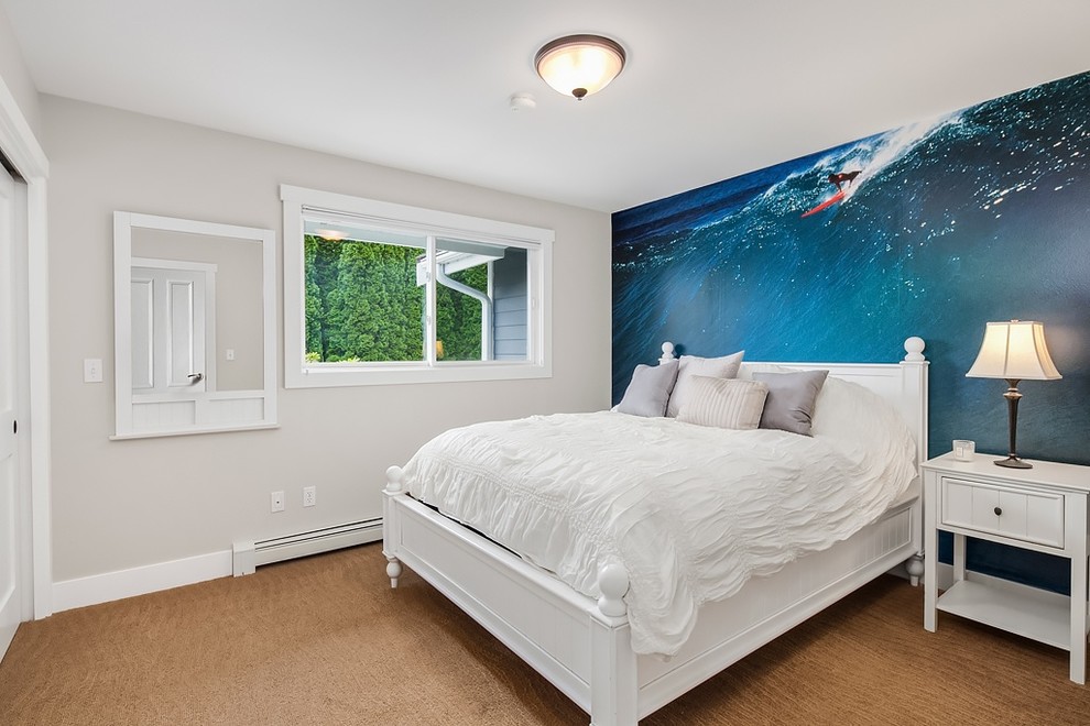 Inspiration for a beach style bedroom in Seattle with grey walls and carpet.