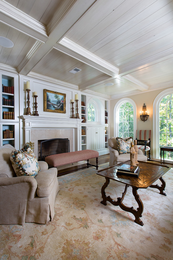 Traditional formal living room in Atlanta with beige walls and a standard fireplace.