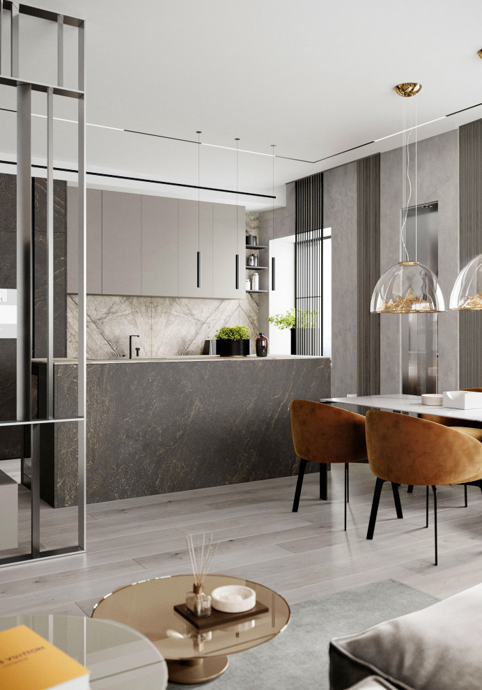 This is an example of a large contemporary single-wall eat-in kitchen in Moscow with grey cabinets, marble benchtops, white splashback, marble splashback, stainless steel appliances, light hardwood floors, with island, grey floor and white benchtop.