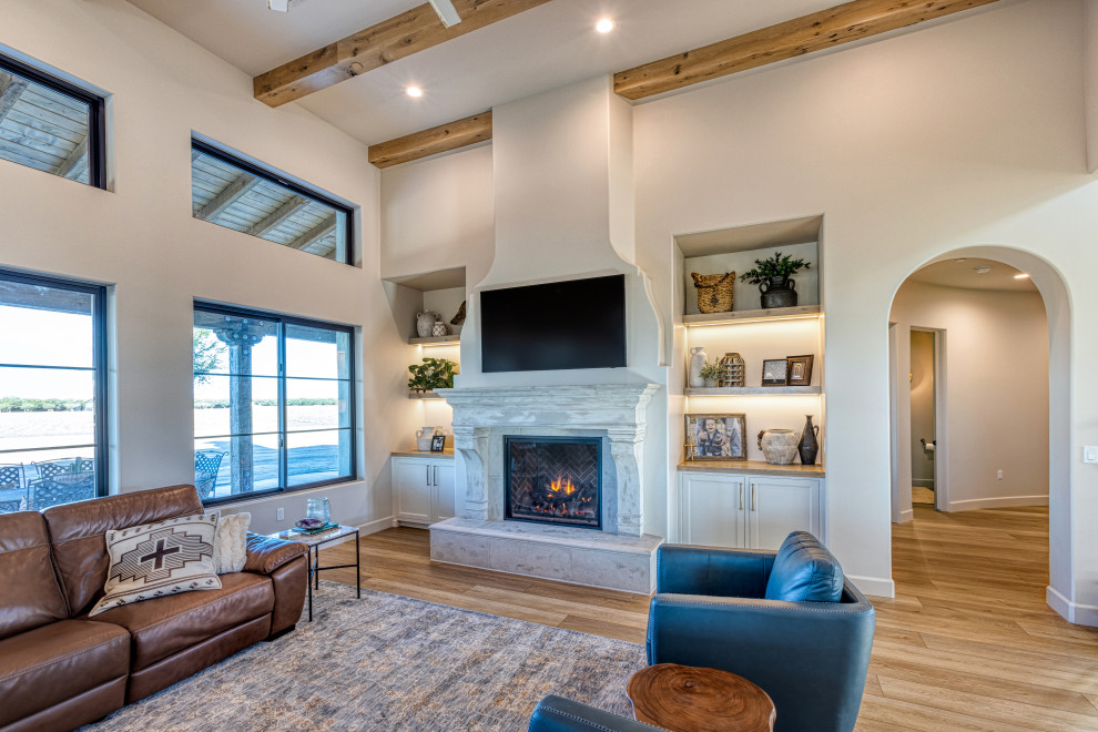 Great Room with Stone Fireplace and Illuminated Built-Ins | Tuscan Farmhouse