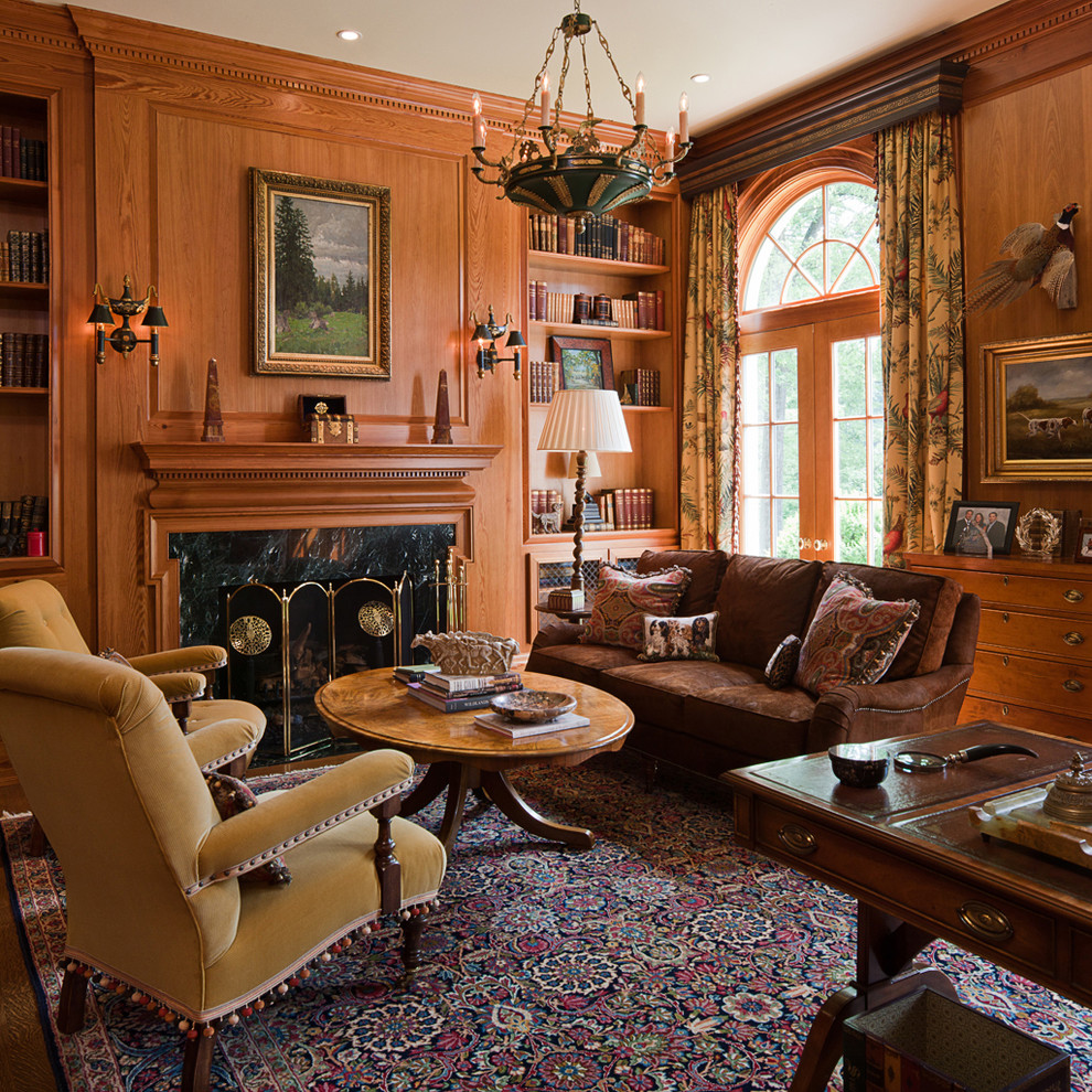 Inspiration for a traditional enclosed family room in Atlanta with a library, a standard fireplace and no tv.