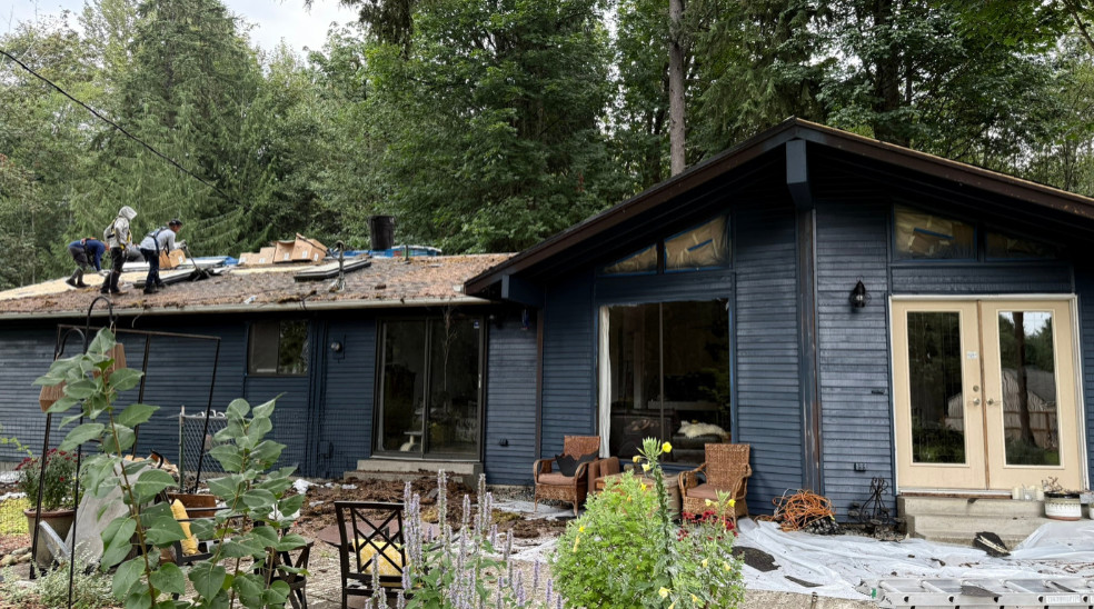 Refreshify Roofing working on moss removal and replacement of some parts of the roof in Monroe