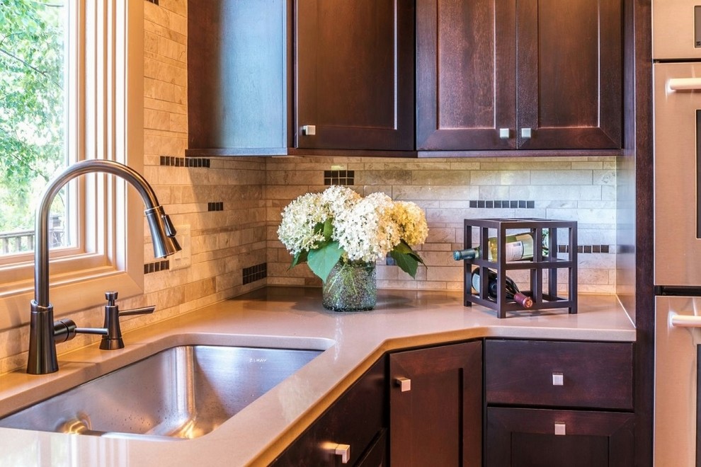 Inspiration for a transitional l-shaped eat-in kitchen remodel