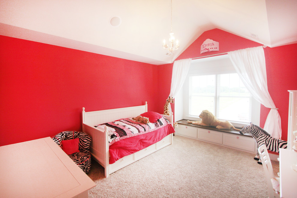 Photo of an arts and crafts loft-style bedroom in Indianapolis with pink walls and carpet.