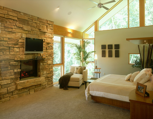 Vaulted Master Bedroom With Stone Fireplace And Raised