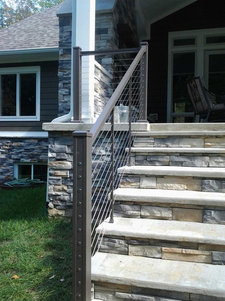 Deck - mid-sized transitional backyard deck idea in Indianapolis with a roof extension