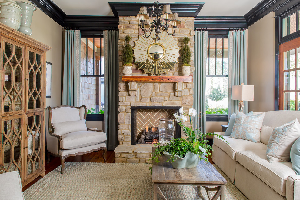 This is an example of a mid-sized traditional formal open concept living room in Atlanta with a standard fireplace, grey walls, dark hardwood floors, a stone fireplace surround and brown floor.
