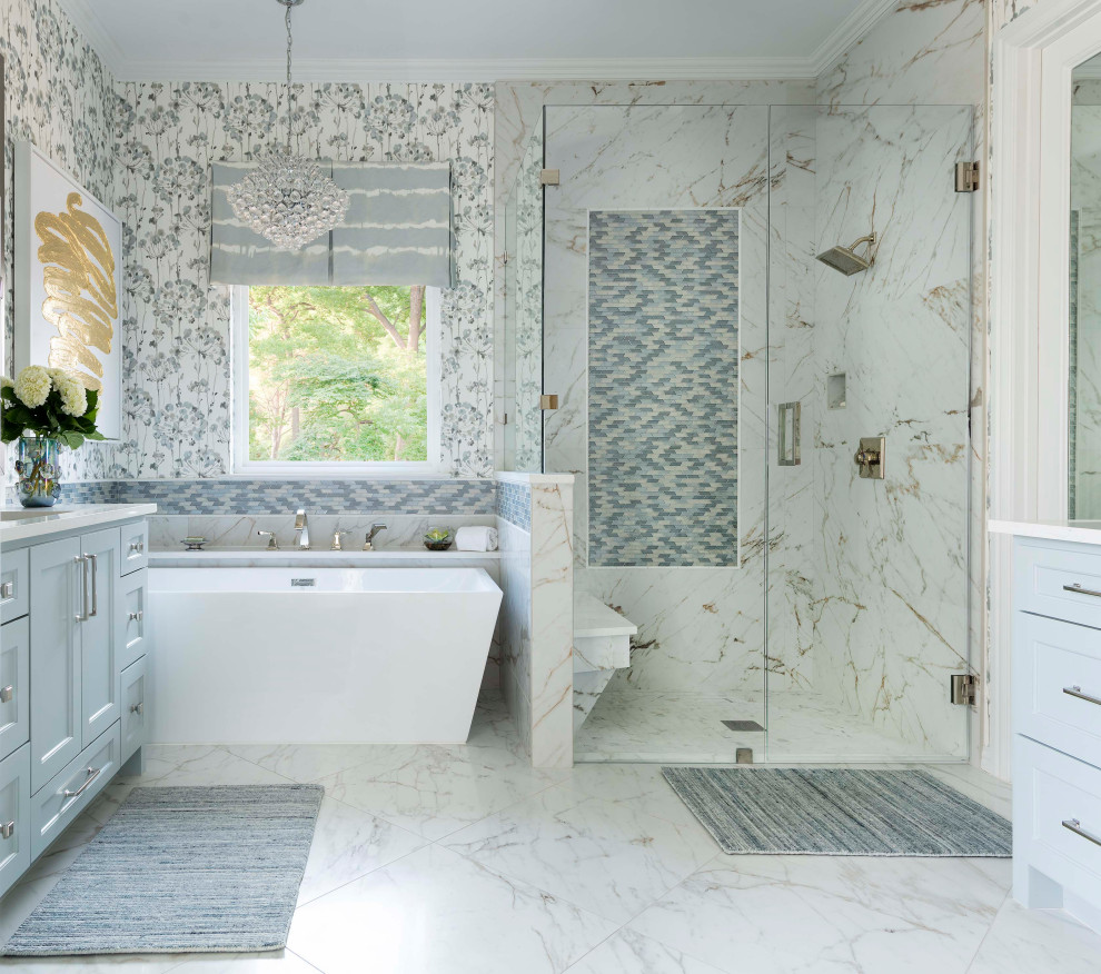 Example of a transitional master white floor, double-sink and wallpaper bathroom design in Dallas with blue cabinets, a bidet, multicolored walls, an undermount sink, a hinged shower door, white countertops and a built-in vanity