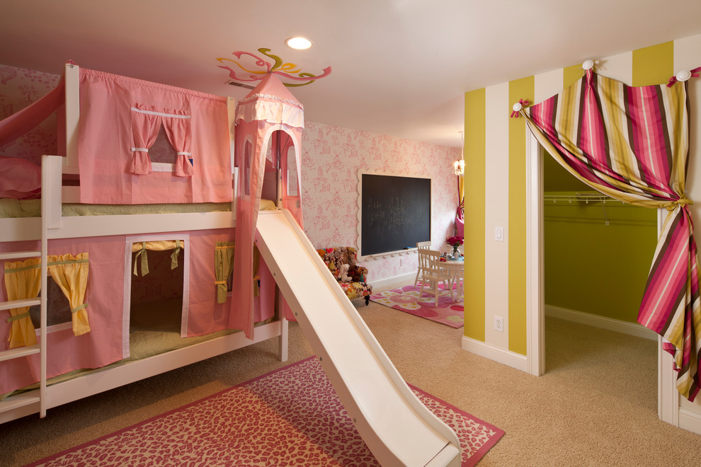 Photo of a mid-sized transitional kids' bedroom for kids 4-10 years old and girls in Cincinnati with multi-coloured walls and carpet.