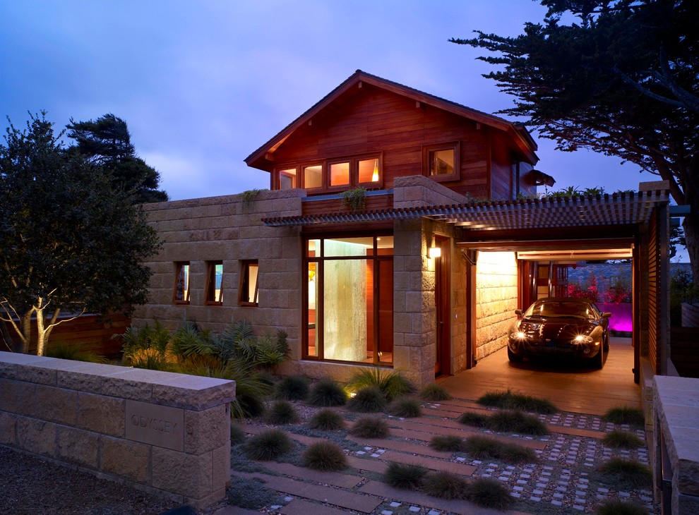 Design ideas for a midcentury two-storey exterior in San Francisco with stone veneer.