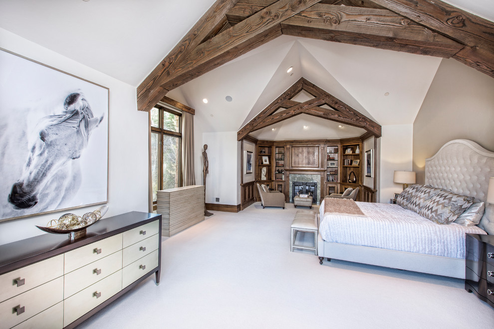Design ideas for an expansive arts and crafts master bedroom in Denver with white walls, carpet, a standard fireplace, white floor and a tile fireplace surround.
