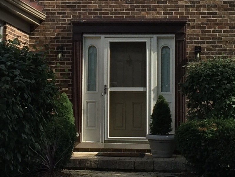 Brown brick. Color door/frame? Leaning towards red door