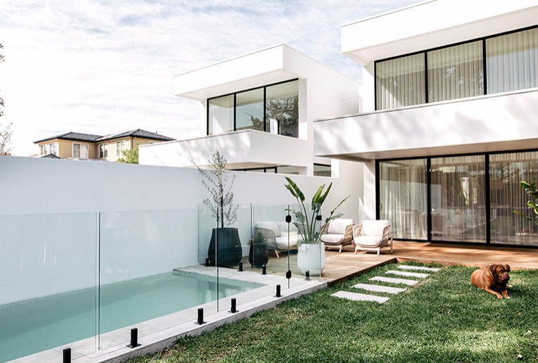 Photo of a contemporary backyard rectangular pool in Sydney.