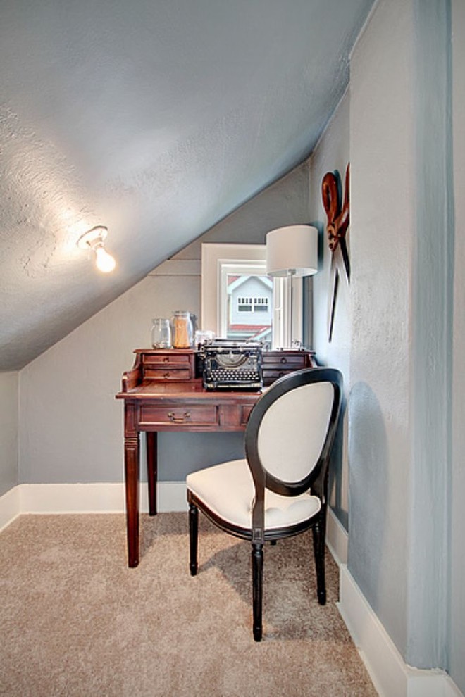 Traditional home office in Seattle with blue walls, carpet and a freestanding desk.