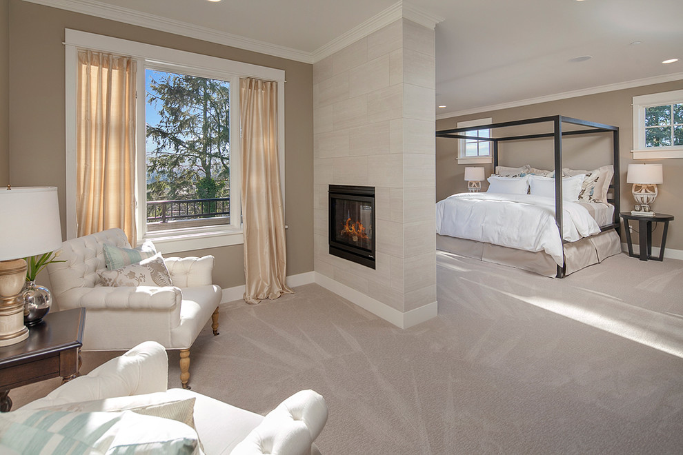 Design ideas for a contemporary master bedroom in Seattle with multi-coloured walls, carpet, a two-sided fireplace and a tile fireplace surround.