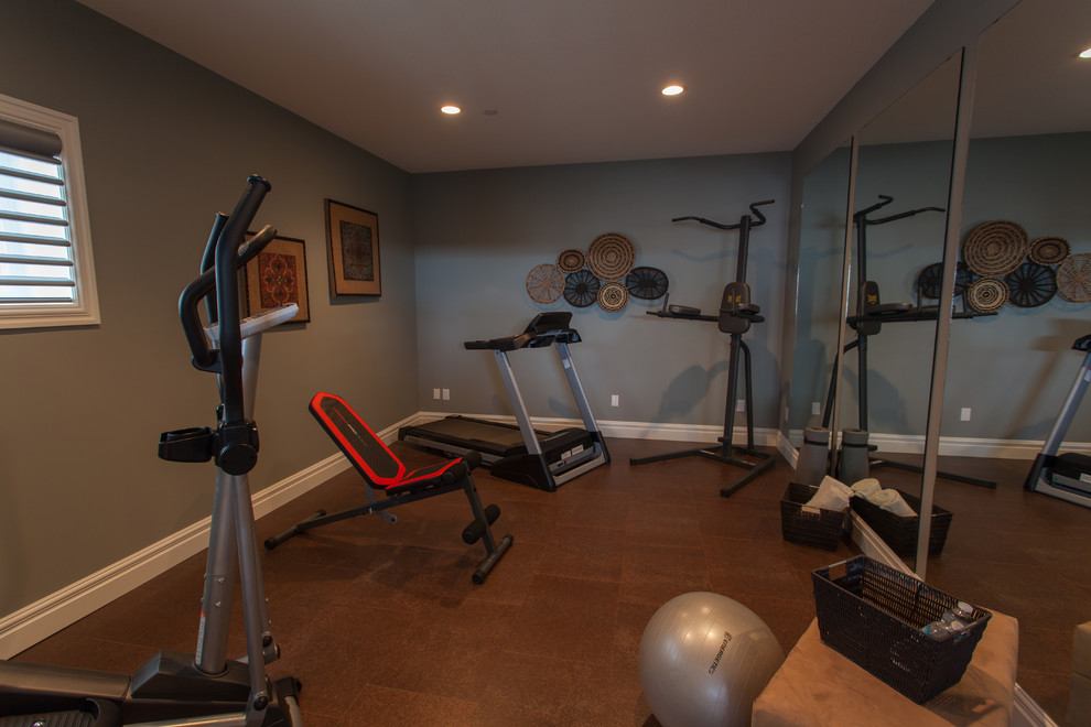 Inspiration for a transitional multipurpose gym in Calgary with blue walls and cork floors.