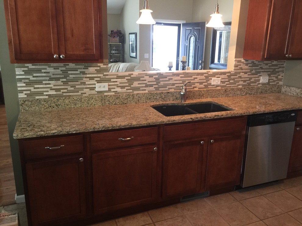 Kitchen - kitchen idea with glass tile backsplash