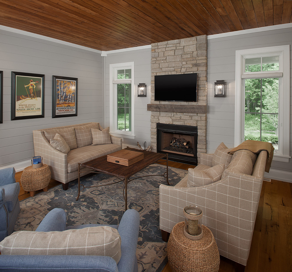 Photo of a transitional family room in Grand Rapids.