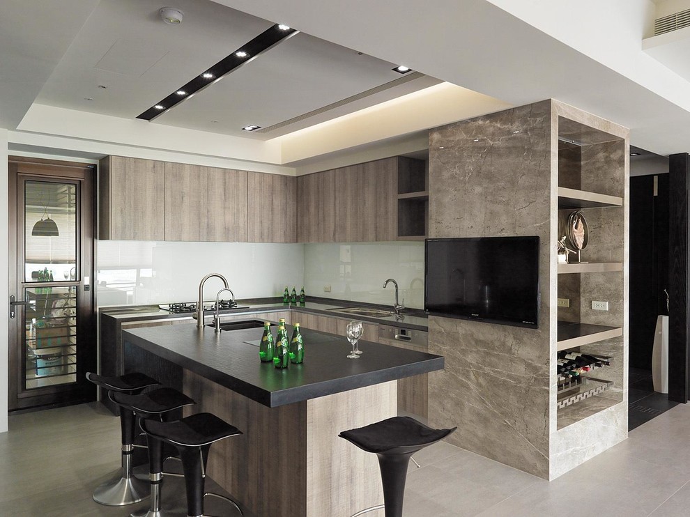 Design ideas for a mid-sized modern l-shaped kitchen in New York with an undermount sink, flat-panel cabinets, brown cabinets, white splashback, glass sheet splashback, panelled appliances, porcelain floors, with island and beige floor.