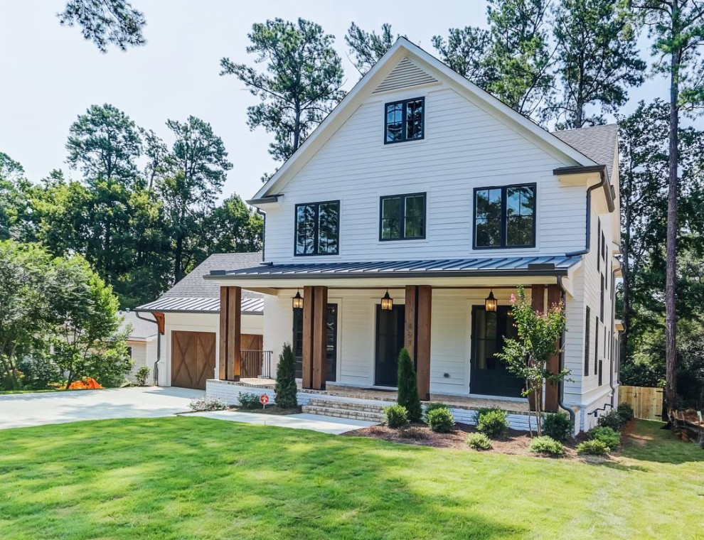 Mountain style two-car garage photo in Atlanta