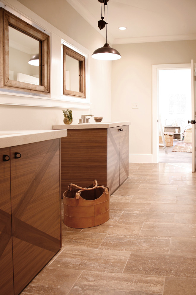 Modern bathroom in Atlanta with flat-panel cabinets, medium wood cabinets and beige tile.