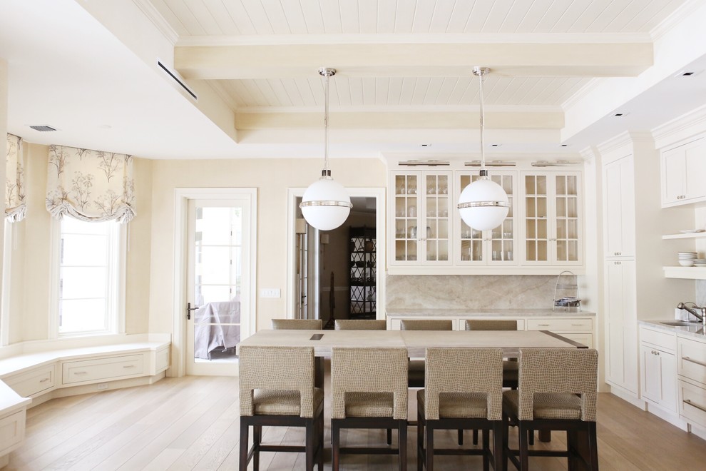 Example of a transitional home design design in Miami
