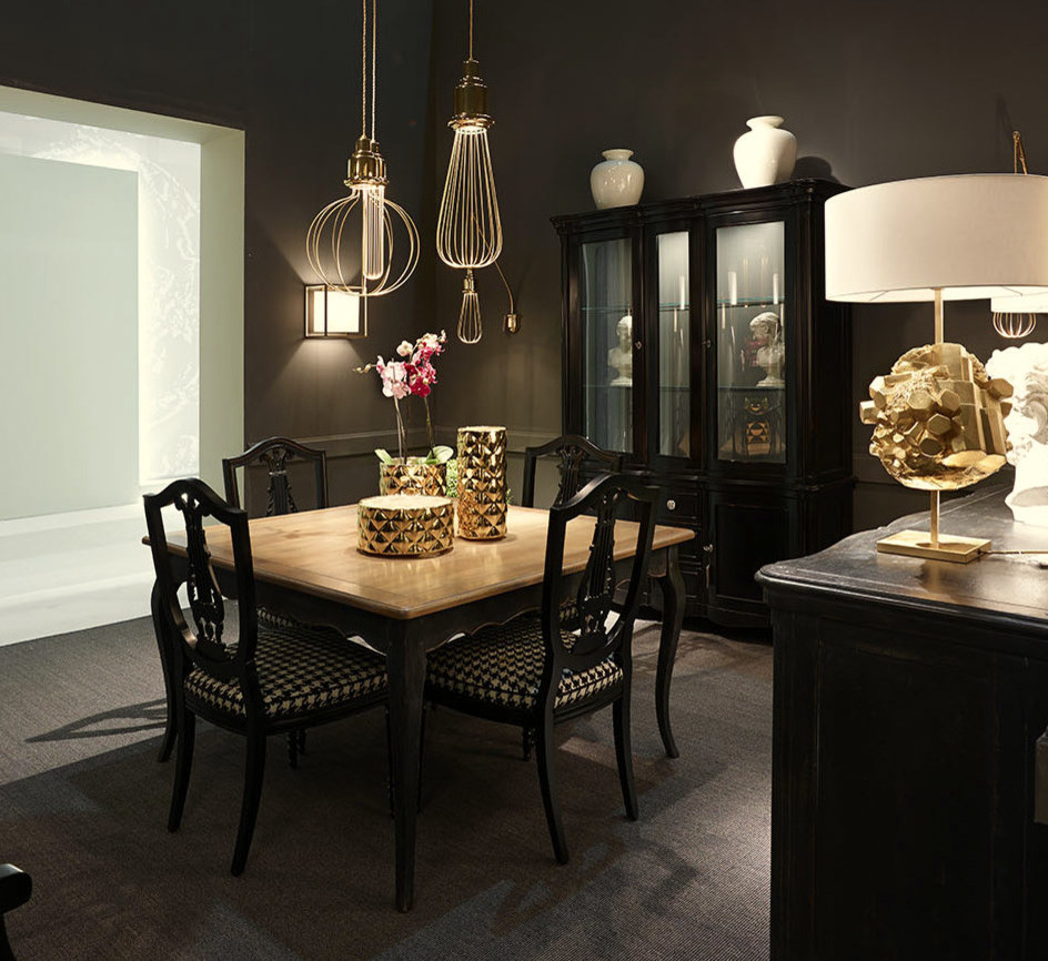 Example of a transitional dining room design in Florence