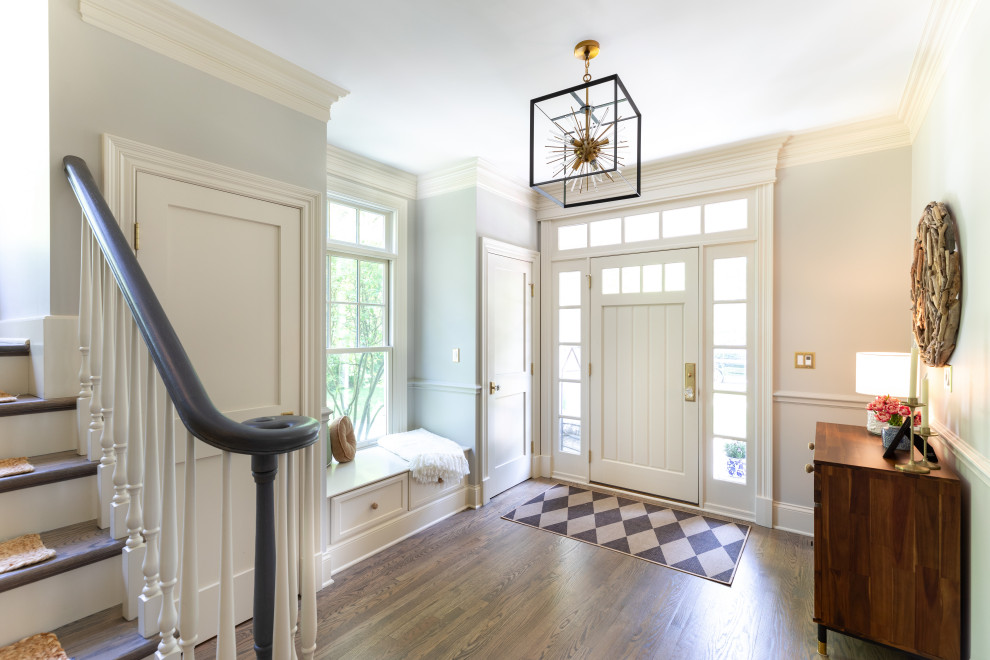 Elegant Entryway with White Door and Natural Light