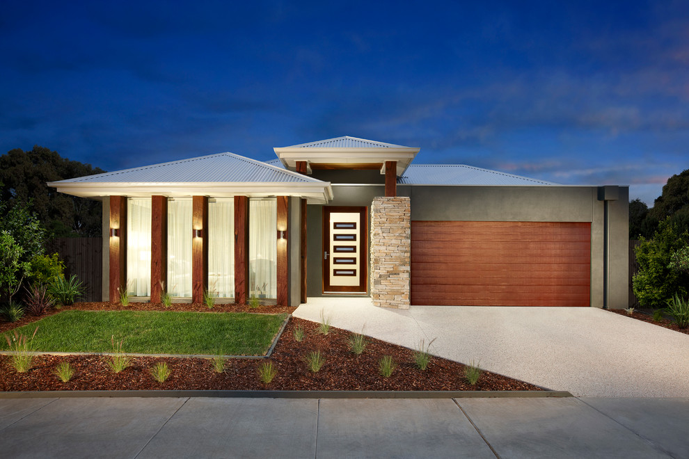 Design ideas for a mid-sized contemporary one-storey brick grey exterior in Geelong with a hip roof.