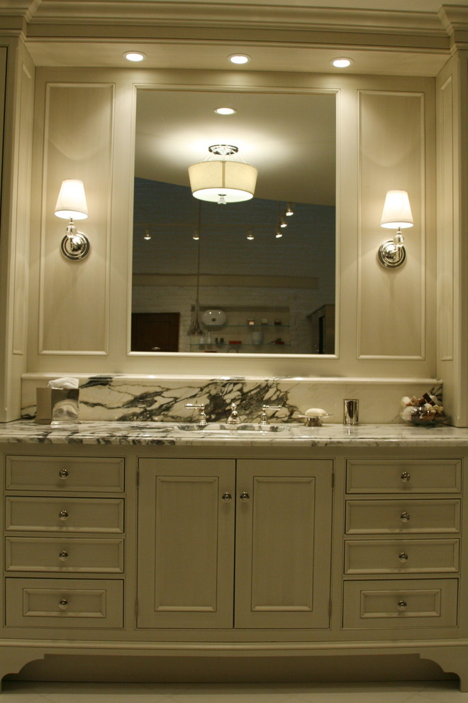 Bathroom - large transitional master gray tile bathroom idea in Chicago with recessed-panel cabinets, distressed cabinets and marble countertops