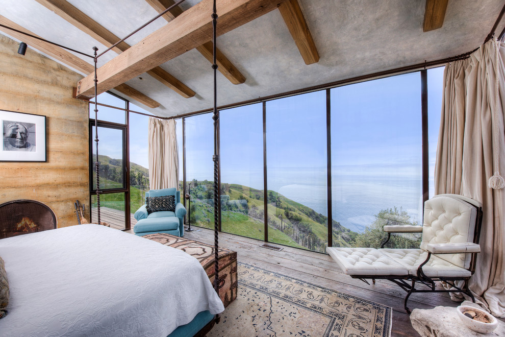 Big Sur Coast Ridge Estate - Breathtaking views of the incomparable Big Sur Coast, this classic Tuscan design of an Italian farmhouse, combined with a modern approach creates an ambiance of relaxed sophistication for this magnificent 95.73-acre, private coastal estate on California’s Coastal Ridge. Five-bedroom, 5.5-bath, 7,030 sq. ft. main house, and 864 sq. ft. caretaker house over 864 sq. ft. of garage and laundry facility. Commanding a ridge above the Pacific Ocean and Post Ranch Inn, this spectacular property has sweeping views of the California coastline and surrounding hills. “It’s as if a contemporary house were overlaid on a Tuscan farm-house ruin,” says decorator Craig Wright who created the interiors. The main residence was designed by renowned architect Mickey Muenning—the architect of Big Sur’s Post Ranch Inn, —who artfully combined the contemporary sensibility and the Tuscan vernacular, featuring vaulted ceilings, stained concrete floors, reclaimed Tuscan wood beams, antique Italian roof tiles and a stone tower. Beautifully designed for indoor/outdoor living; the grounds offer a plethora of comfortable and inviting places to lounge and enjoy the stunning views. No expense was spared in the construction of this exquisite estate.