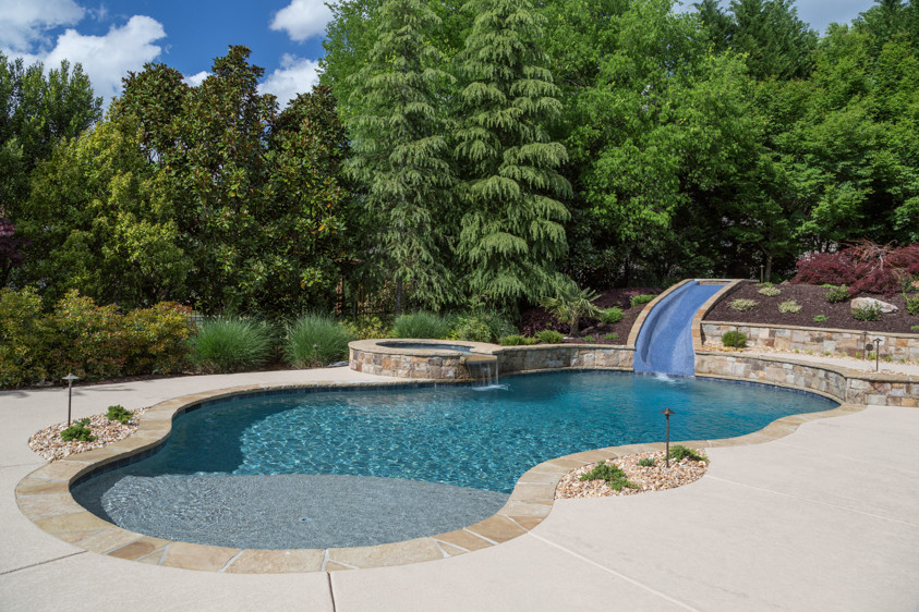 Inspiration for a rustic pool remodel in Atlanta