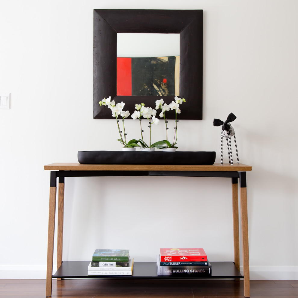 Entry hall - mid-sized transitional entry hall idea in Toronto with white walls