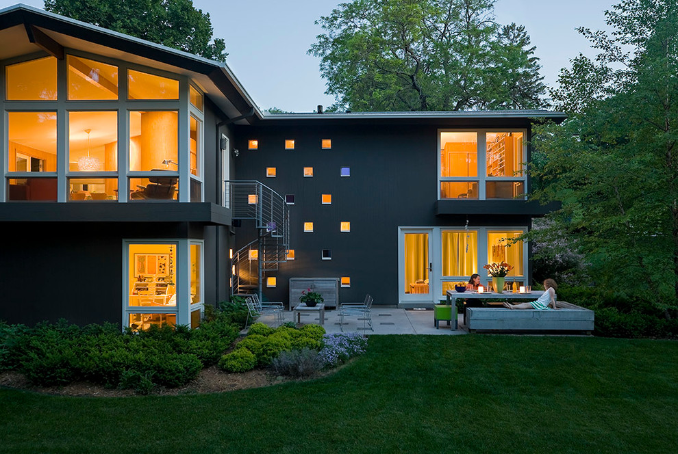 Design ideas for a contemporary two-storey black exterior in Minneapolis.