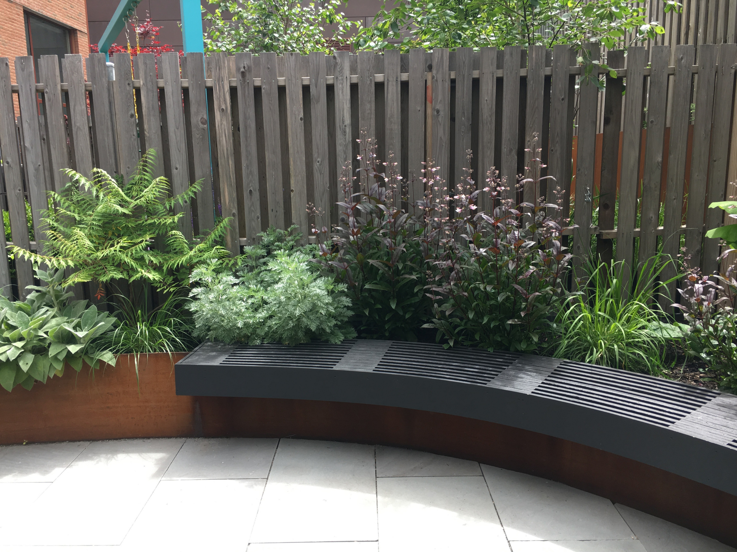 Modern Garden with Curved Corten Border