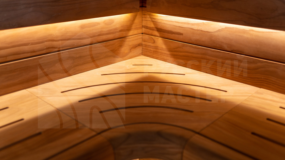 Сауна с изогнутыми полками из новозеландской сосны Pino Premio