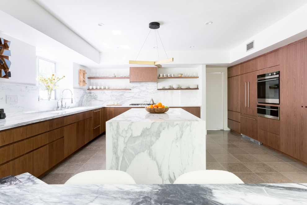 Inspiration for a large contemporary l-shaped eat-in kitchen in Los Angeles with an undermount sink, flat-panel cabinets, brown cabinets, marble benchtops, white splashback, marble splashback, panelled appliances, ceramic floors, with island and grey floor.