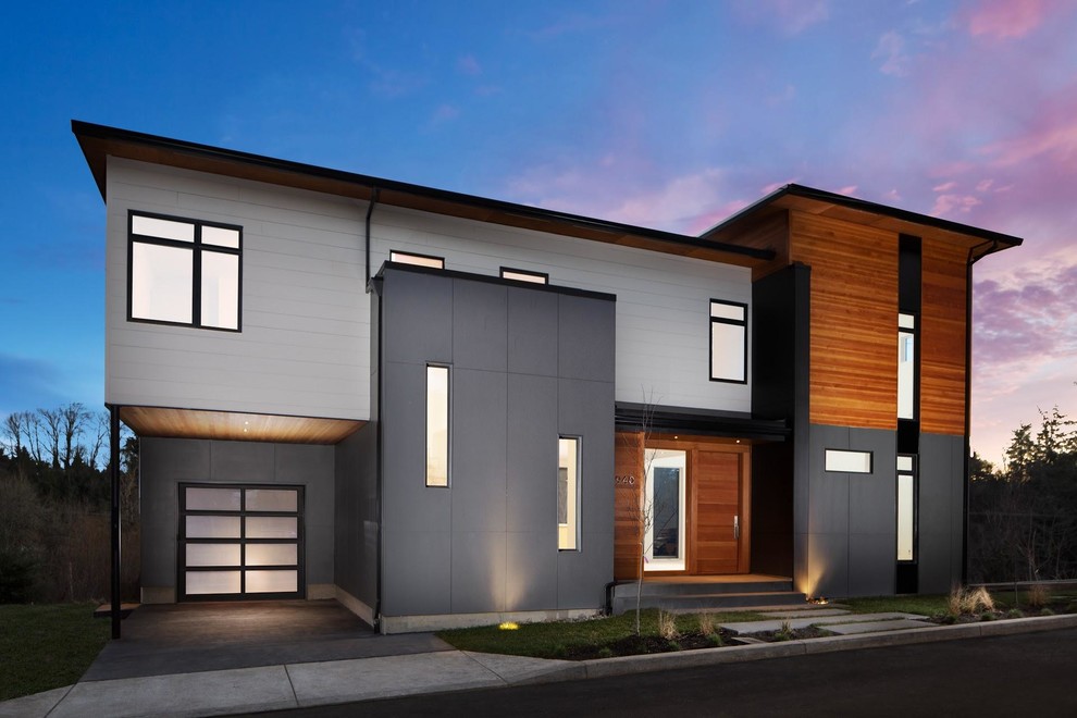 Design ideas for a large modern two-storey grey house exterior in Portland with mixed siding.