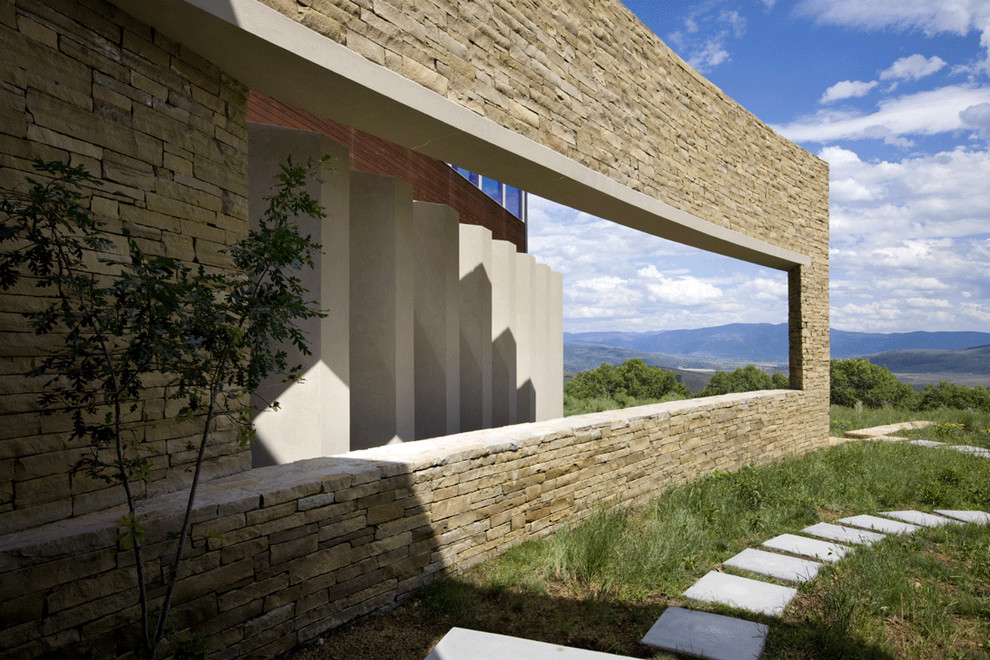Design ideas for a contemporary exterior in Salt Lake City with stone veneer.