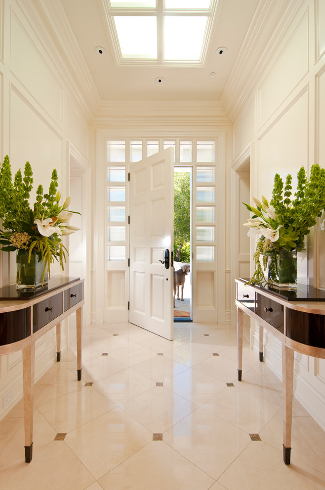 Inspiration for a traditional foyer in San Francisco with white walls, a single front door and a white front door.