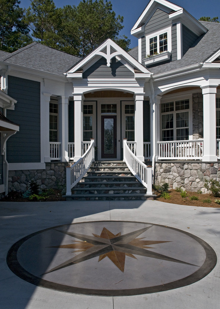 Design ideas for a traditional entryway in Raleigh with a single front door and a glass front door.