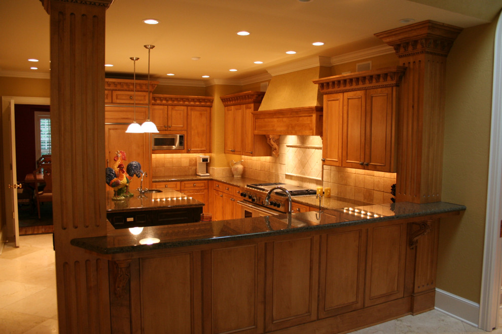 Example of a transitional kitchen design in Omaha