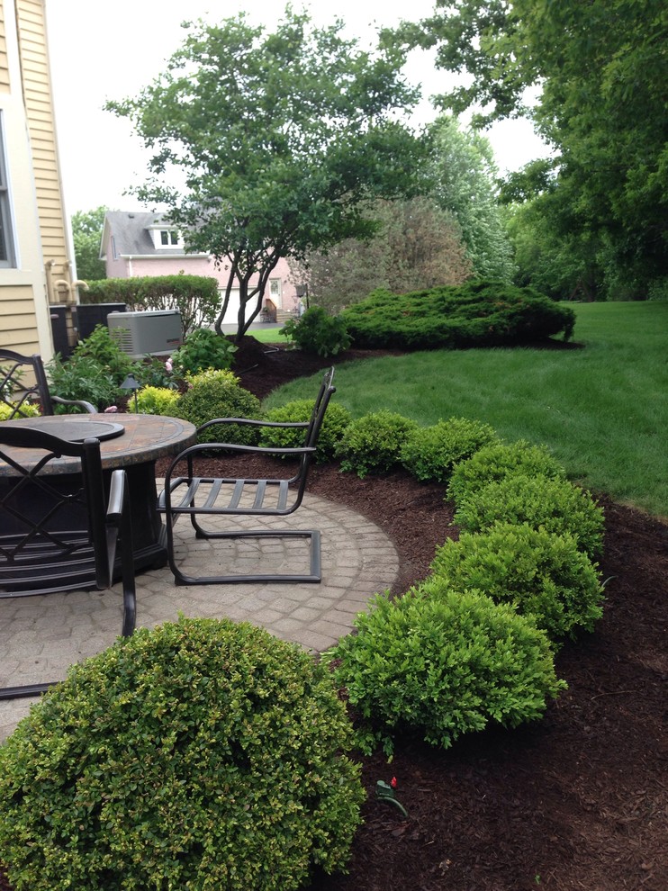 I designed with new boxwoods. What a change