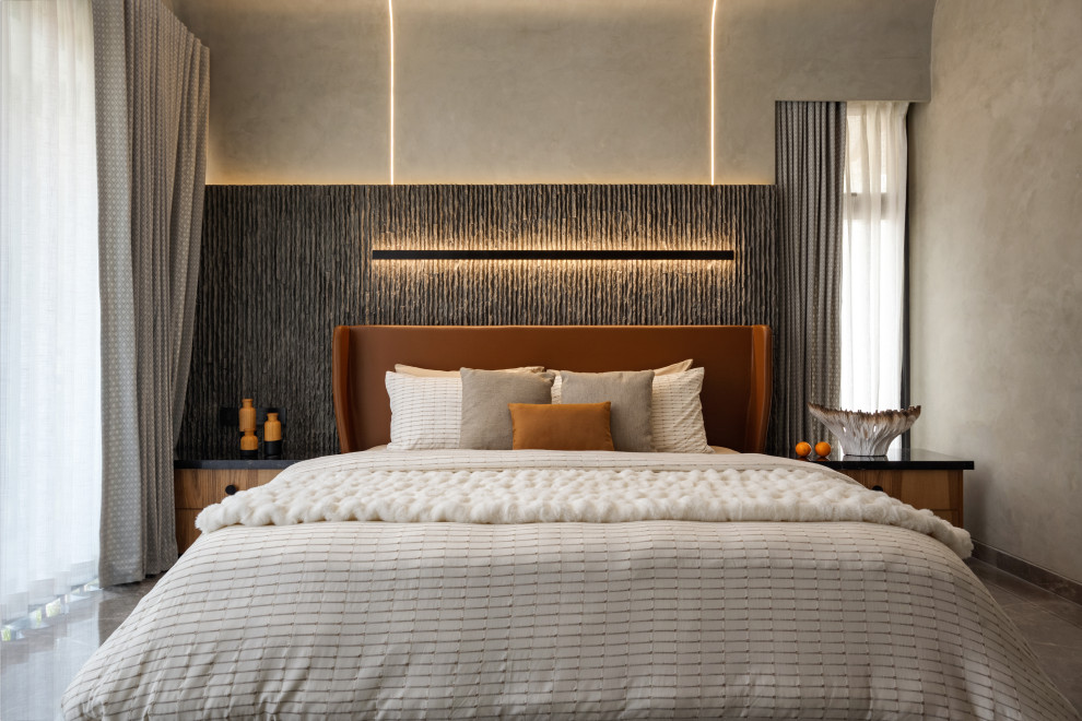 Photo of a contemporary bedroom With Grey Walls and Gray.
