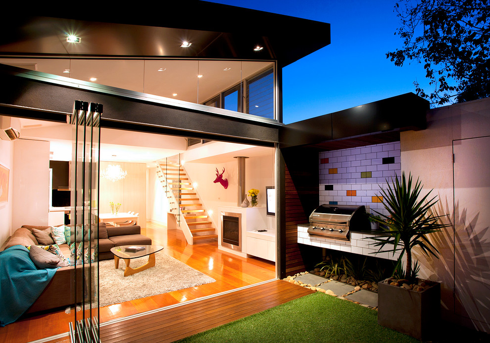 This is an example of a contemporary two-storey black exterior in Melbourne.