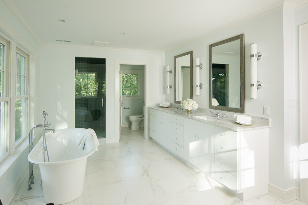 Design ideas for a country bathroom in New York with a freestanding tub.