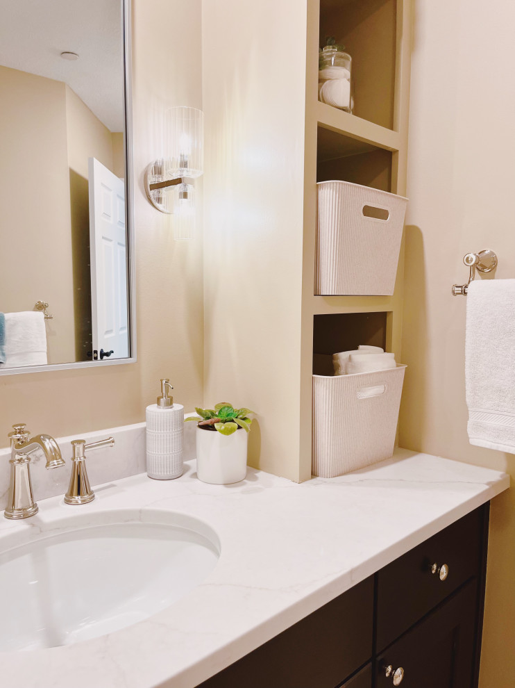 Inspiration for a mid-sized transitional white tile and ceramic tile porcelain tile, beige floor and single-sink alcove bathtub remodel with shaker cabinets, dark wood cabinets, a two-piece toilet, beige walls, an undermount sink, quartz countertops, beige countertops and a built-in vanity