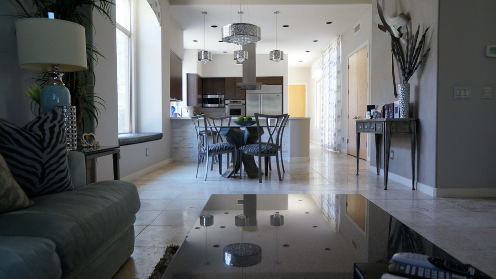 Open concept kitchen - mid-sized transitional u-shaped travertine floor and beige floor open concept kitchen idea in Phoenix with a single-bowl sink, flat-panel cabinets, quartz countertops, white backsplash, stone tile backsplash, stainless steel appliances and an island