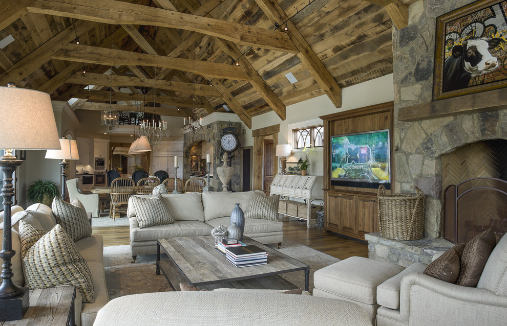 Inspiration for a country formal open concept living room in Baltimore with white walls, dark hardwood floors, a standard fireplace, a stone fireplace surround and a wall-mounted tv.